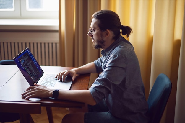 Successful web design student working on project